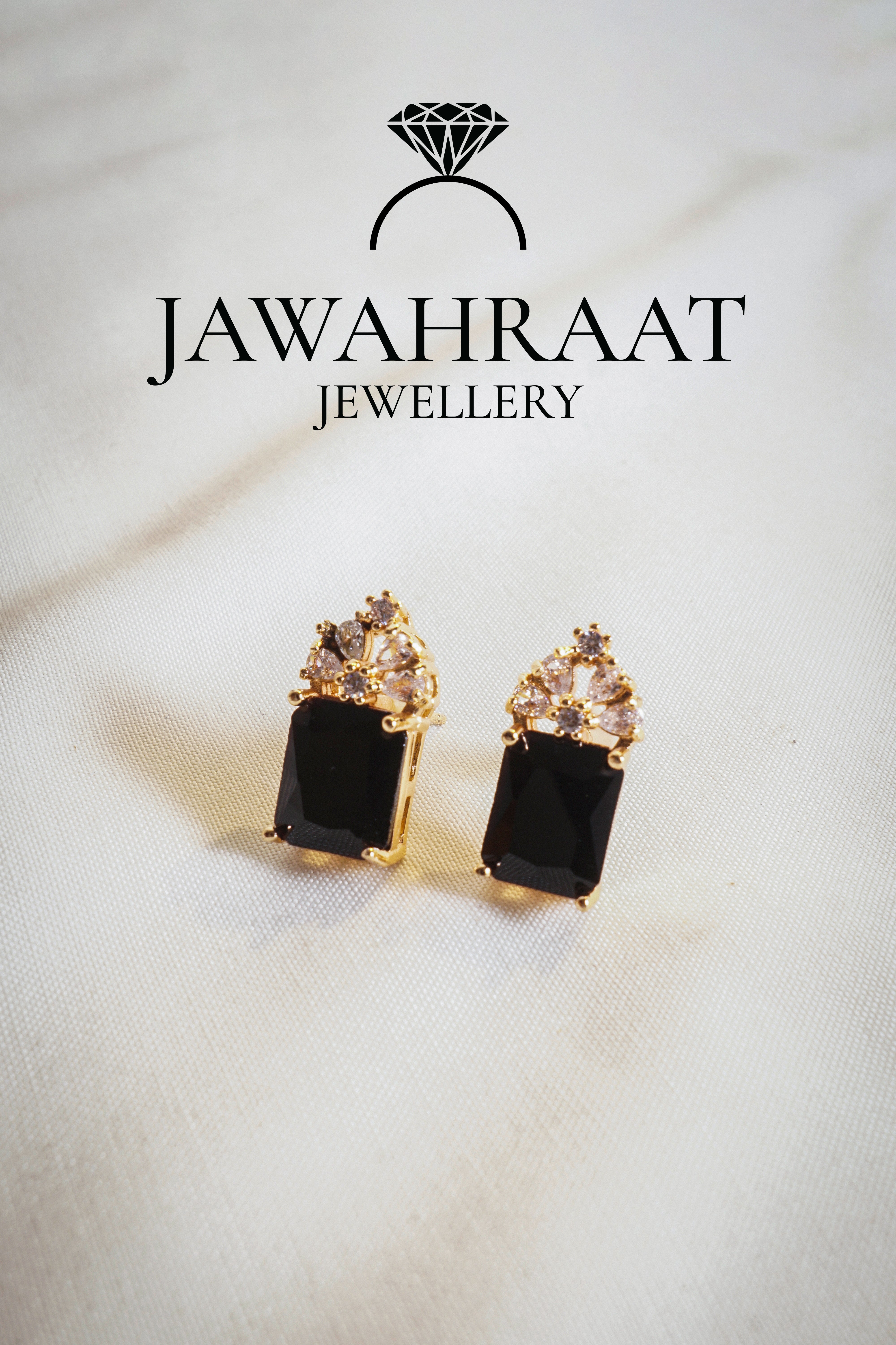 Black stone dangle earrings with silver-toned design | Party wear earrings