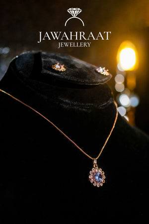 Elegant gold-plated necklace with floral crystal pendant design, perfect for formal and festive looks