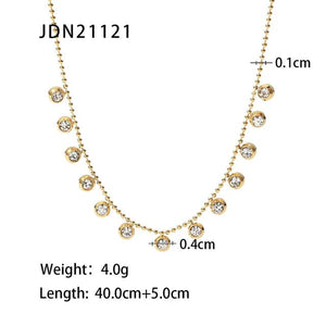 Gold crystal dangle necklace size reference showing chain length and crystal size