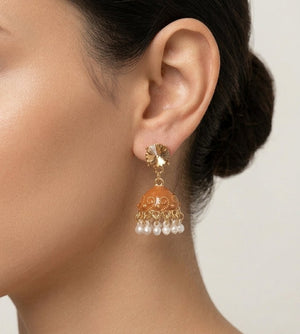 Amber meenakari jhumka earrings with pearl drops worn by model
