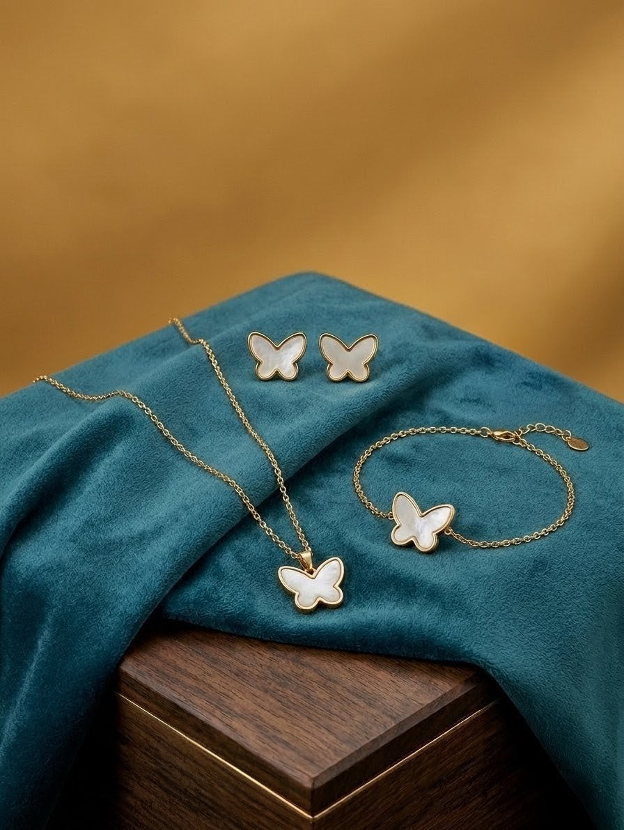 Mother of pearl butterfly jewelry set with gold plated necklace earrings and bracelet display