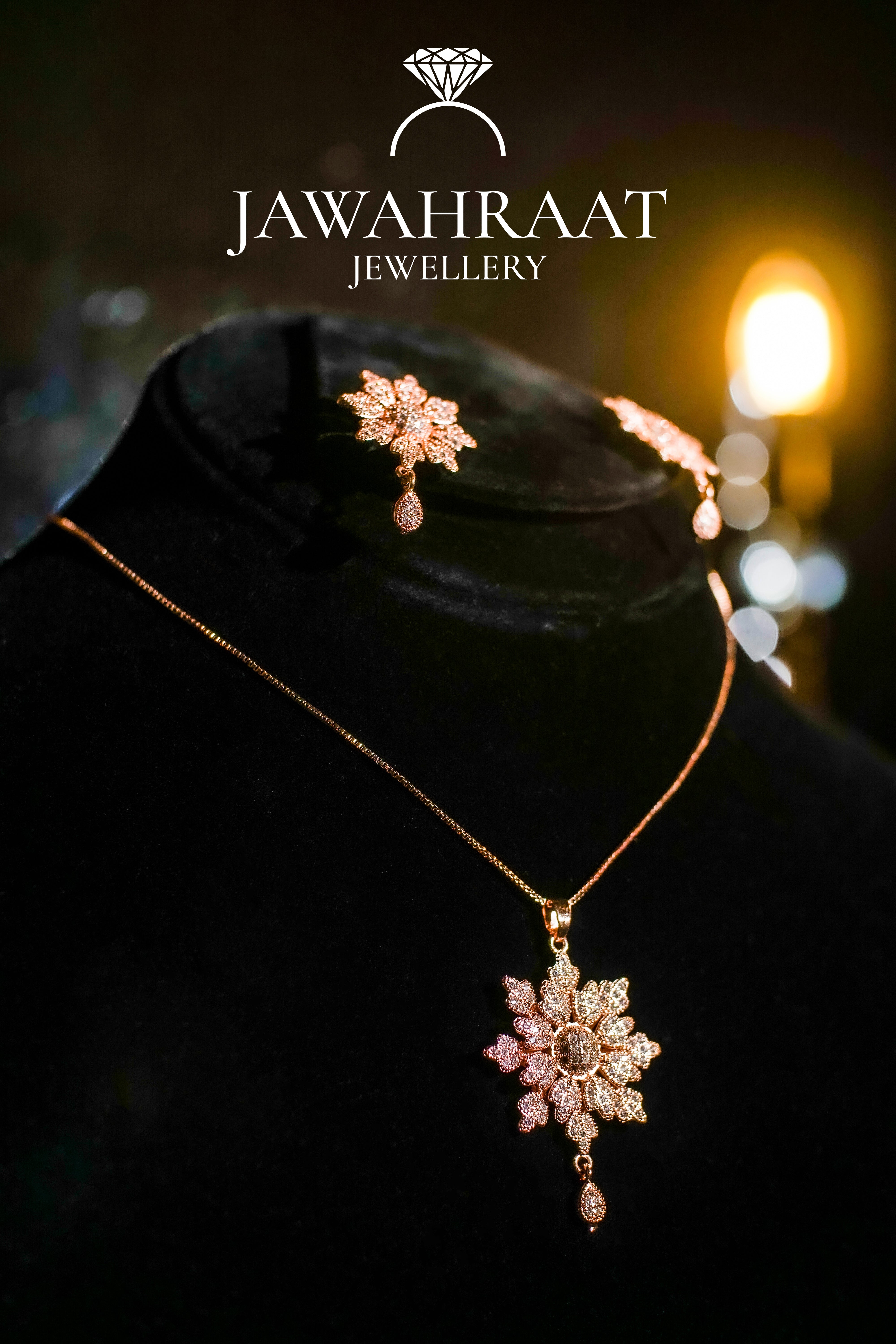 Gold-toned floral necklace encrusted with sparkling white stones from Jawahraat Jewellery