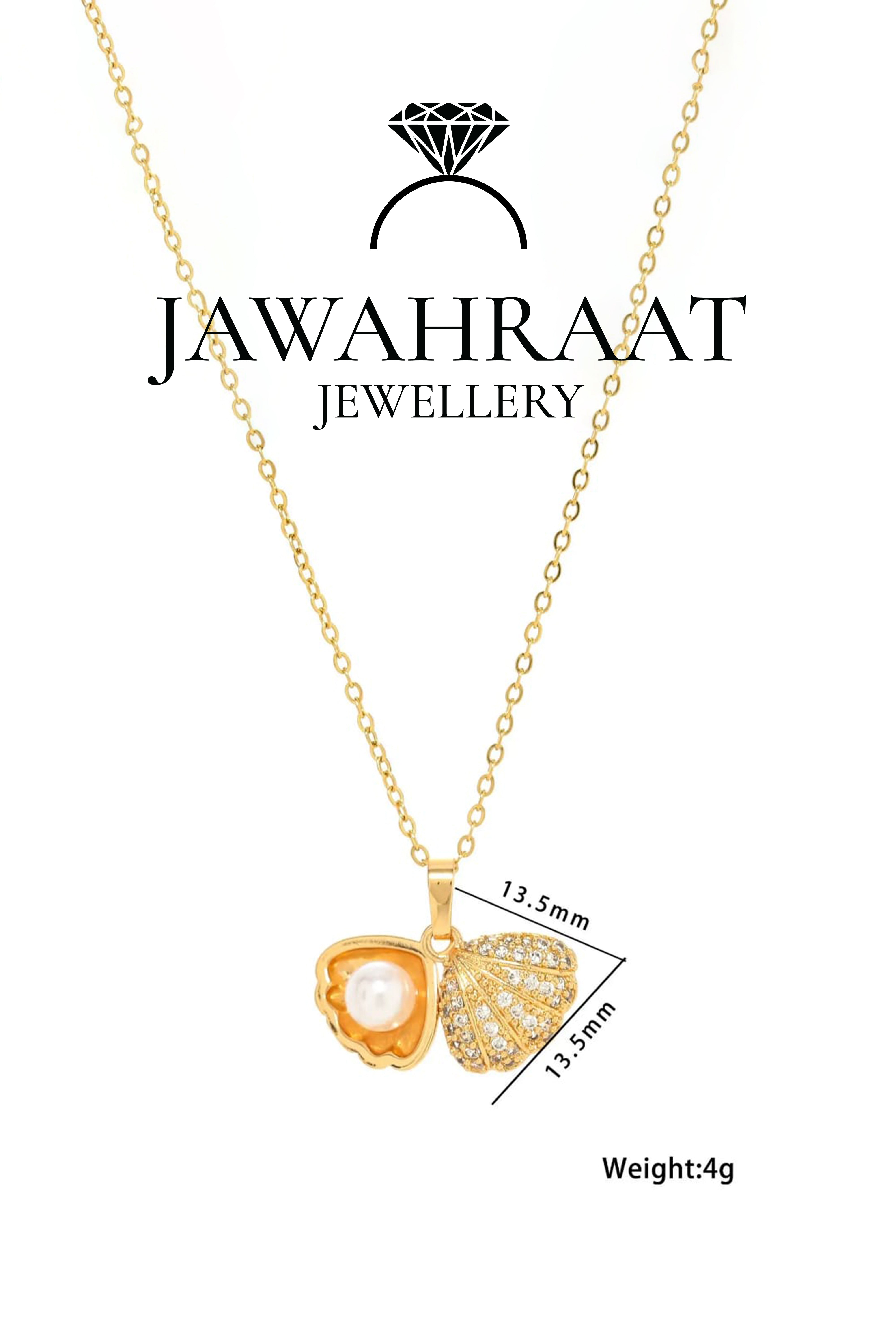 Front-facing image of Jawahraat Jewellery's gold-toned seashell necklace displaying the pendant size and intricate details of the faux pearl centerpiece.

