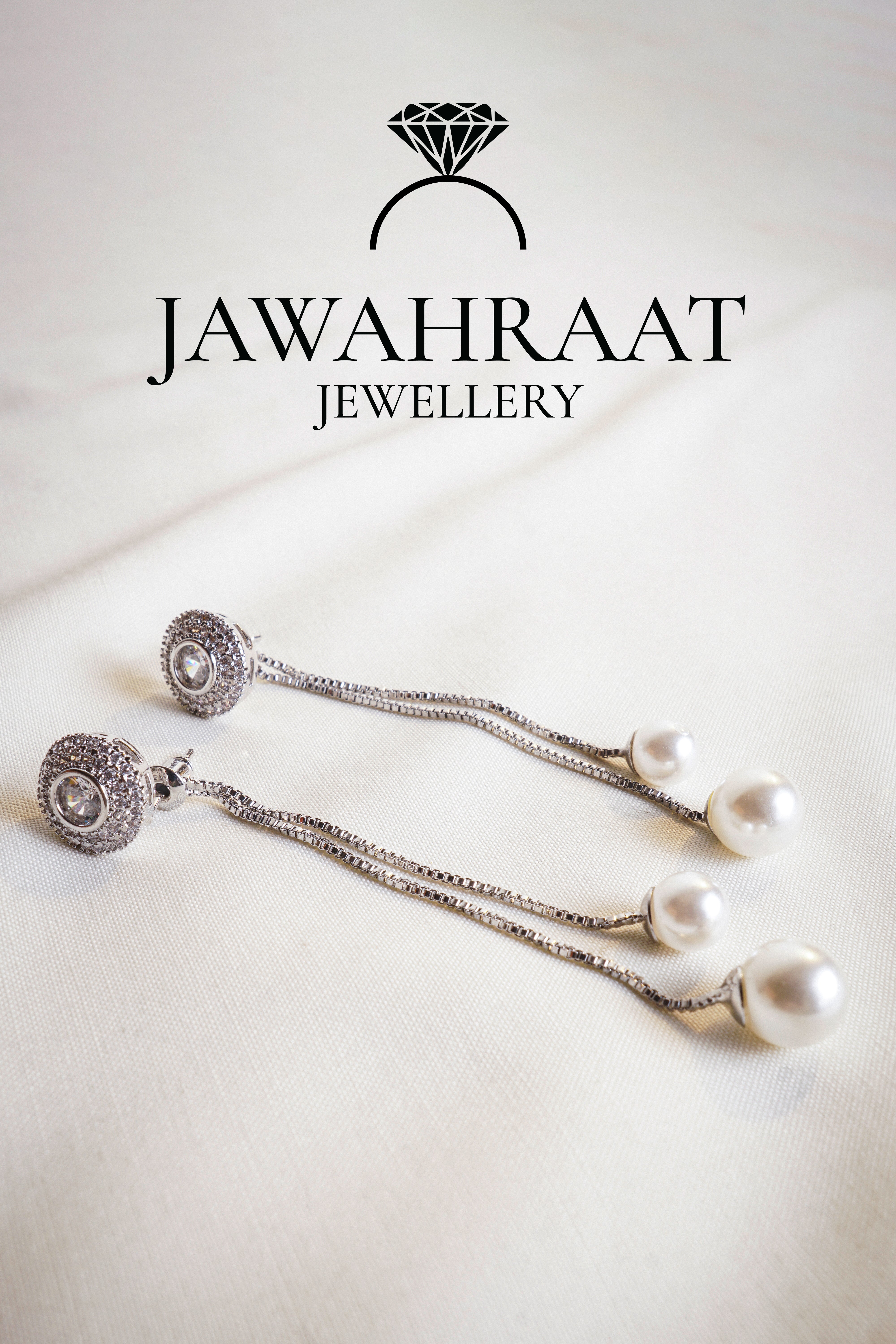 Elegant silver drop earrings with crystal stud top and dangling pearl beads – Jawahraat Jewellery


