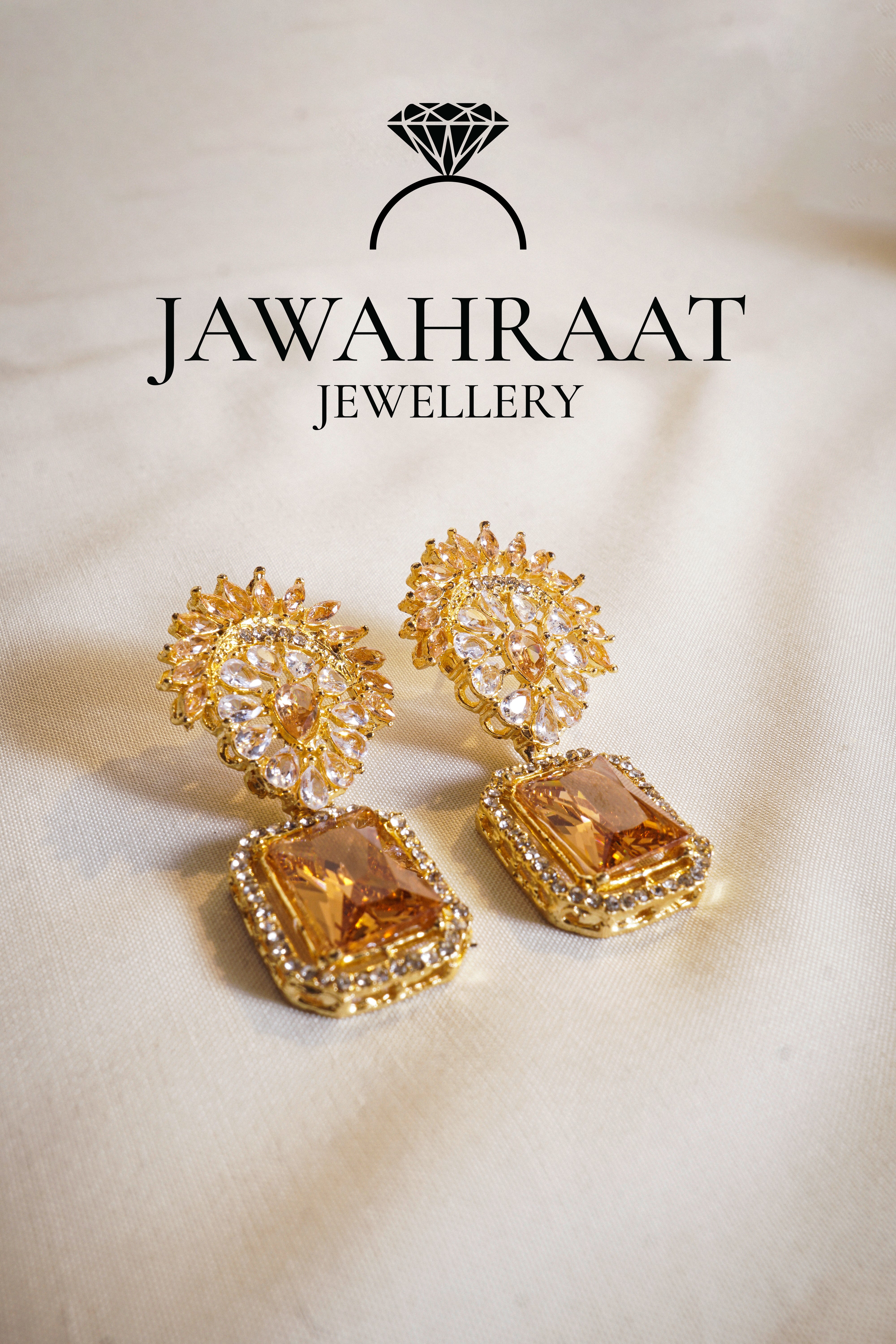 Front view of Zareen Earrings with soft peach stones in gold-toned finish

