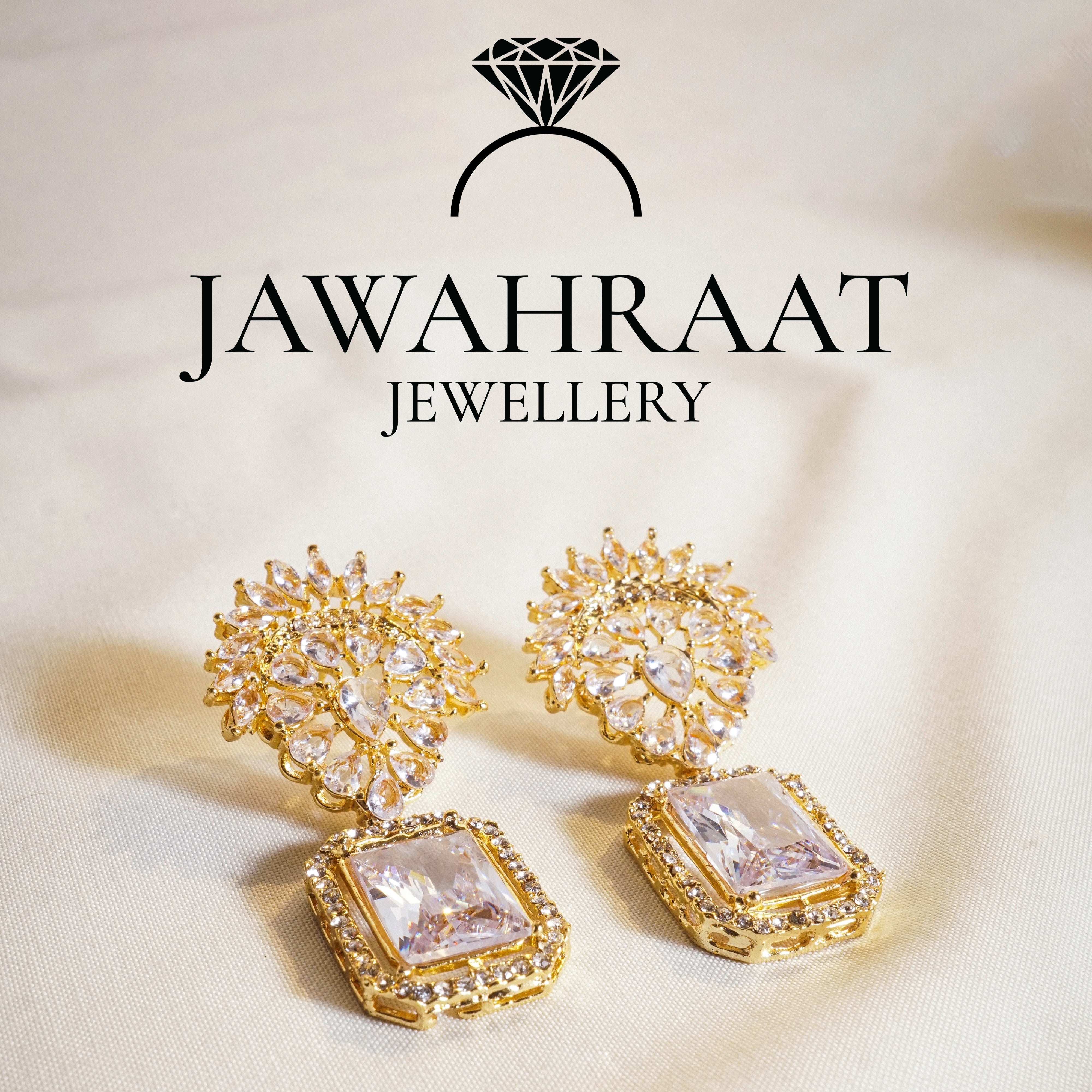 Front view of Zareen Earrings with classic white stones on gold-plated base

