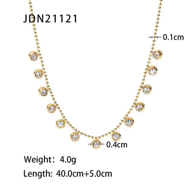 Gold crystal dangle necklace size reference showing chain length and crystal size