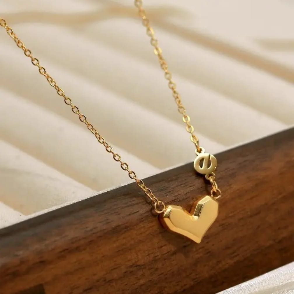 Gold heart pendant necklace close-up