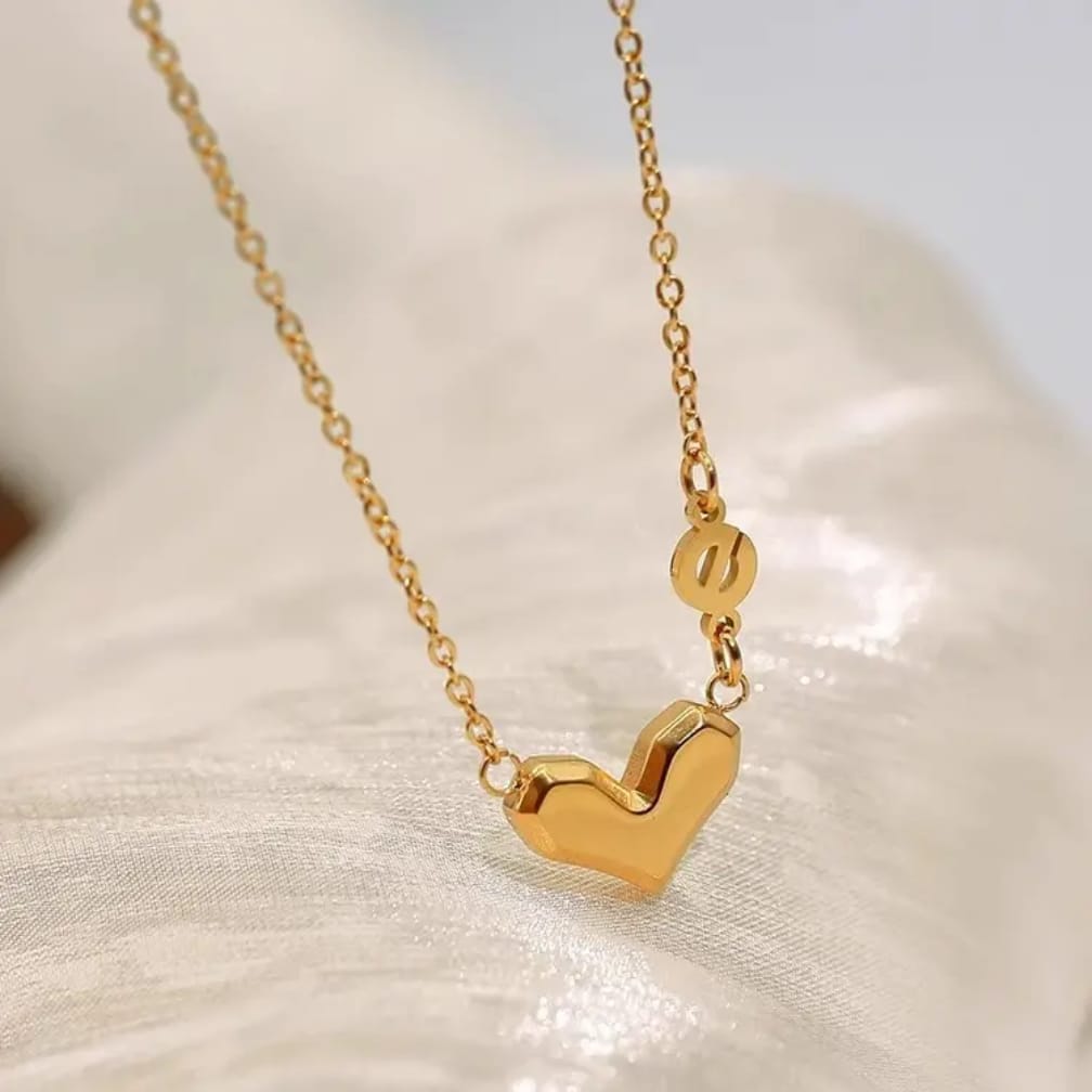 Minimal gold heart necklace with polished finish