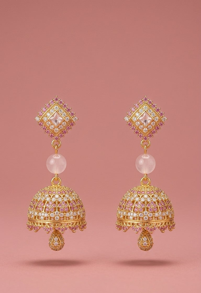 Gold plated jhumka earrings with rose pink and white stones front view detailed design