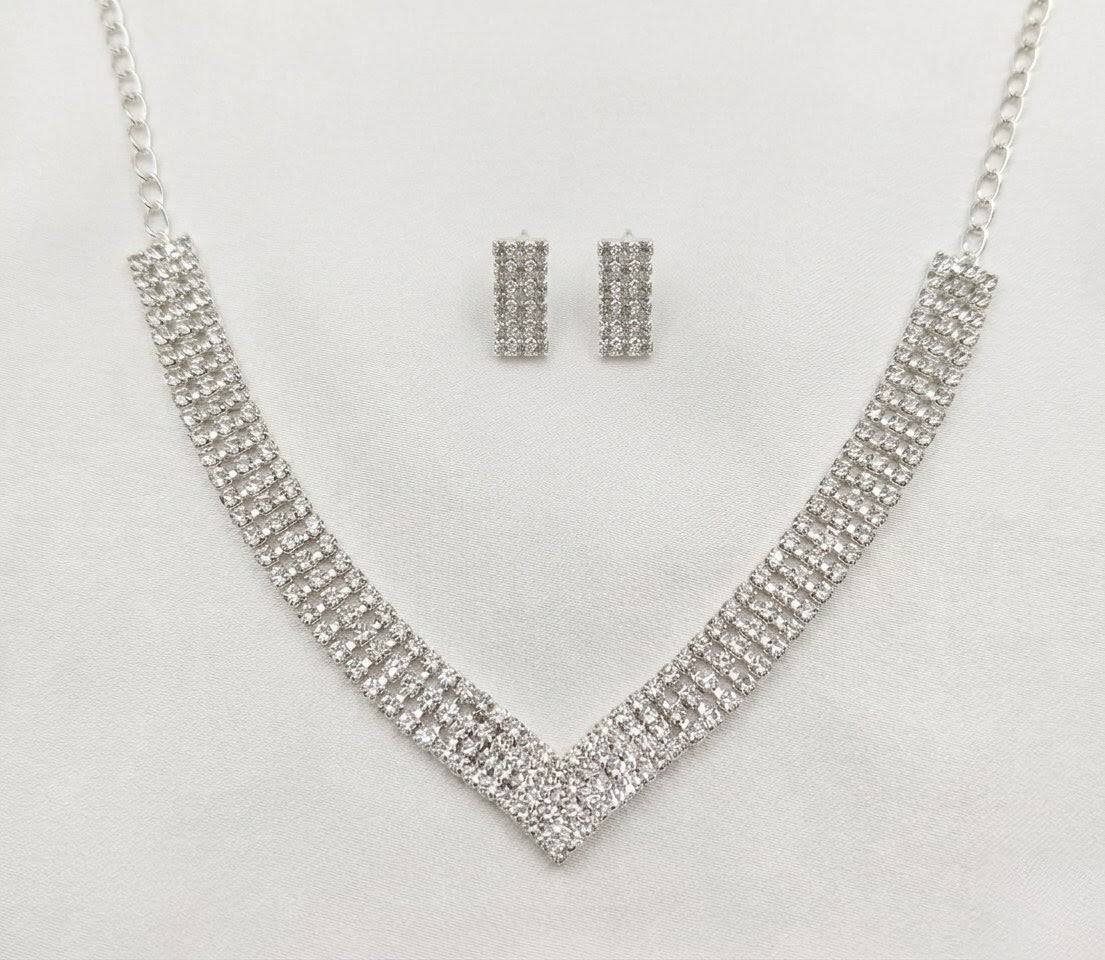 Silver rhinestone necklace and earrings set with diamond like shine