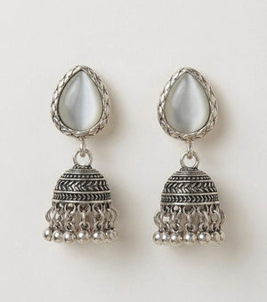 Pair of silver oxidized jhumka earrings showing full design and detailing